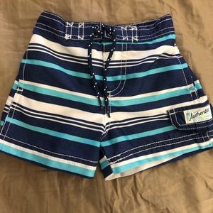 Board shorts style swim trunks